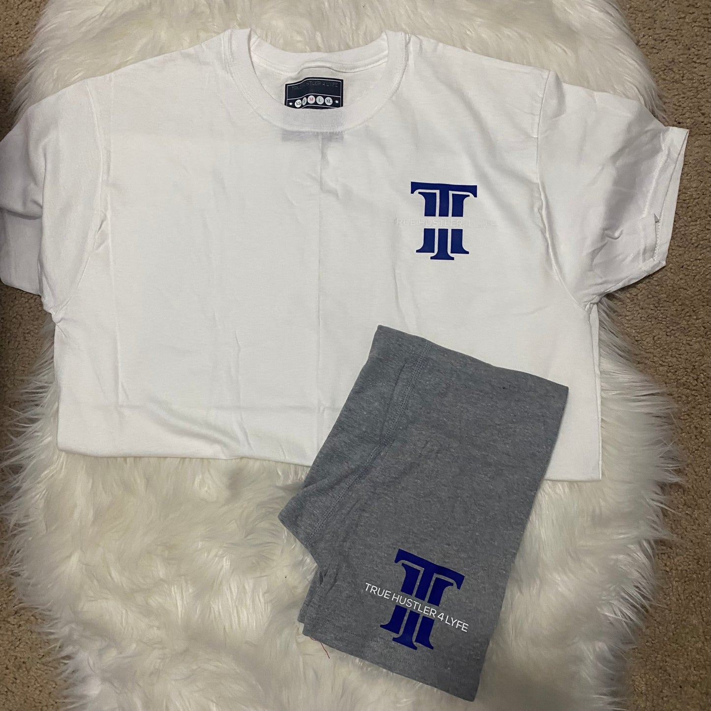 "Upgrade Your Style: Men's Light Grey Boxer Briefs and White T-Shirt Set with Blue Logo"